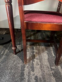 Random unidentified hair stuck to chair