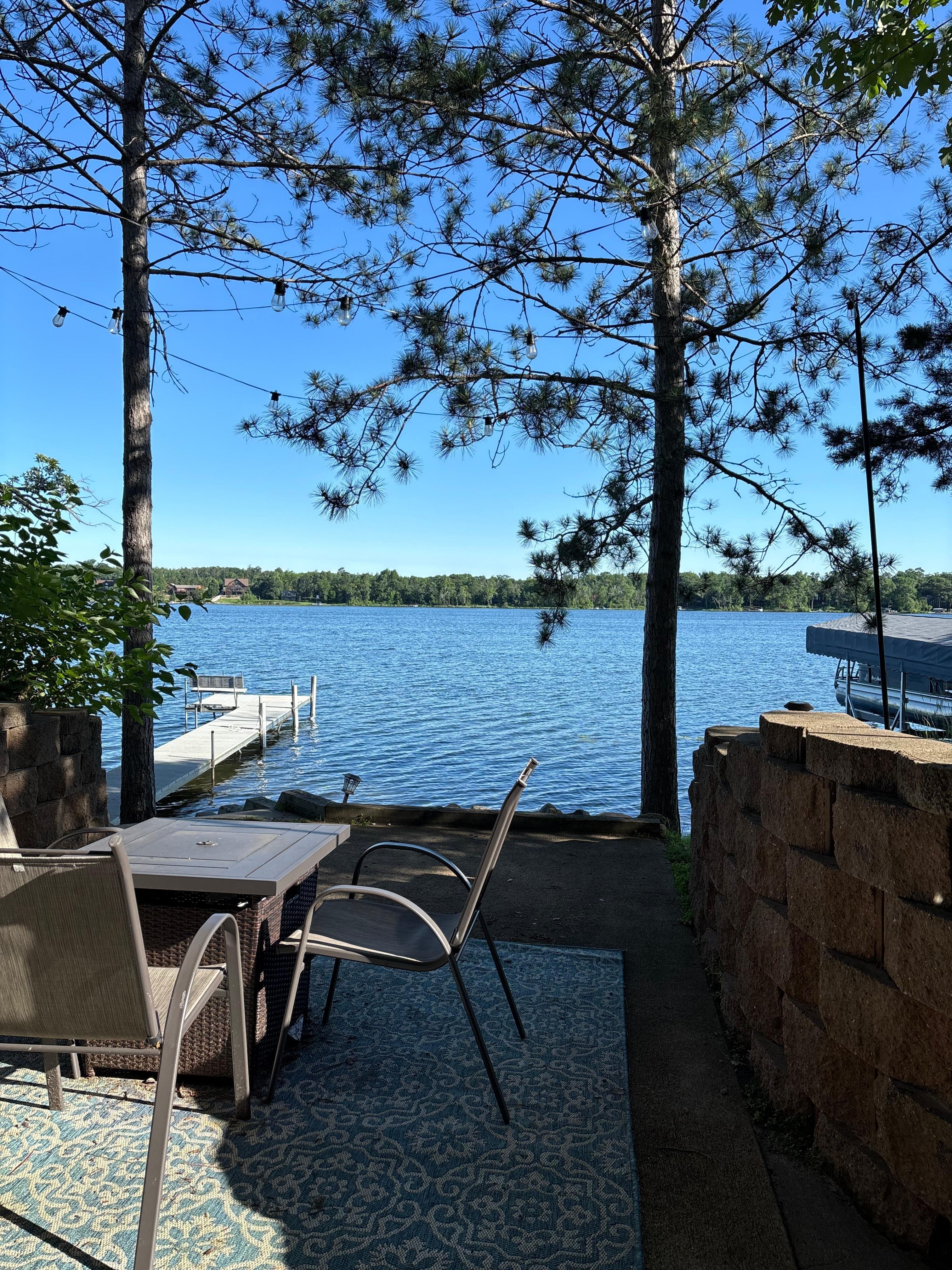 Lower level deck area with a fire table