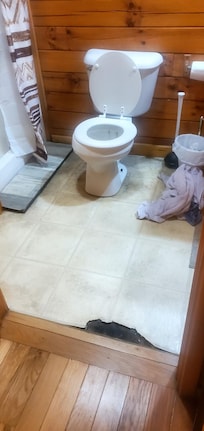 Bathroom floor.torn up & smelled like urine.