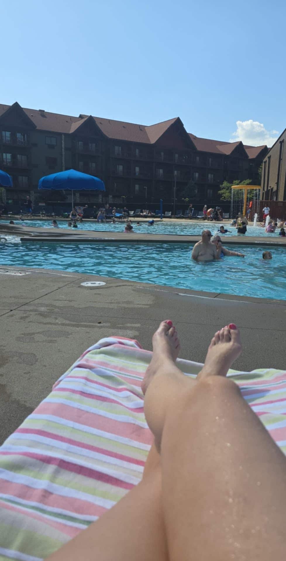 Pool side for mom to relax while kiddo has a blast in a perfect depth pool. Clean and chairs were free!