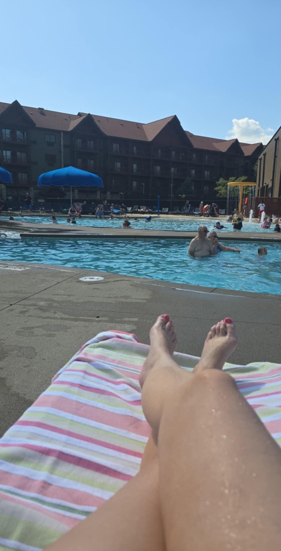 Pool side for mom to relax while kiddo has a blast in a perfect depth pool. Clean and chairs were free! 