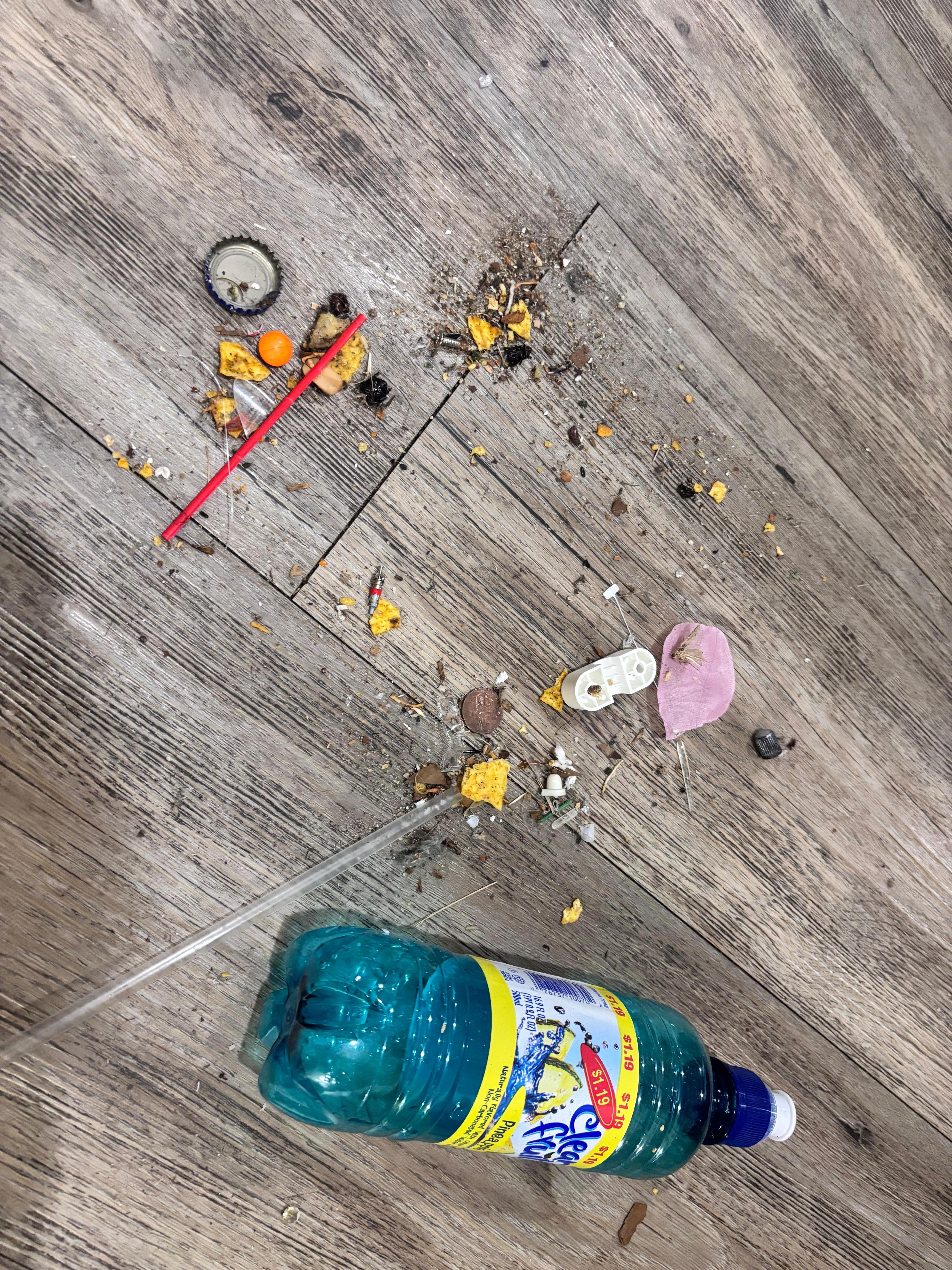 Contents of floor after having to sweep ourselves 