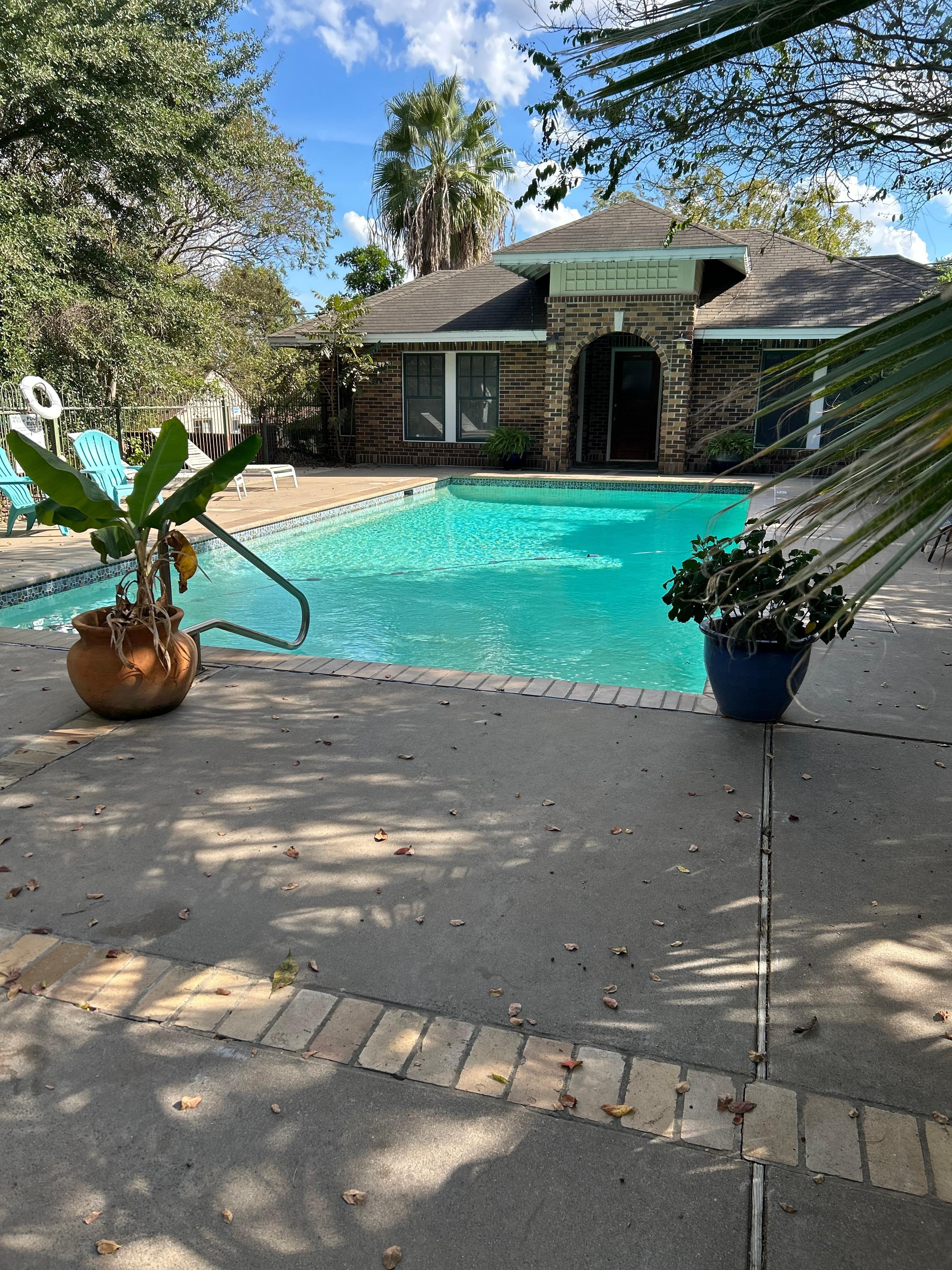 Pool also included outdoor kitchen space 