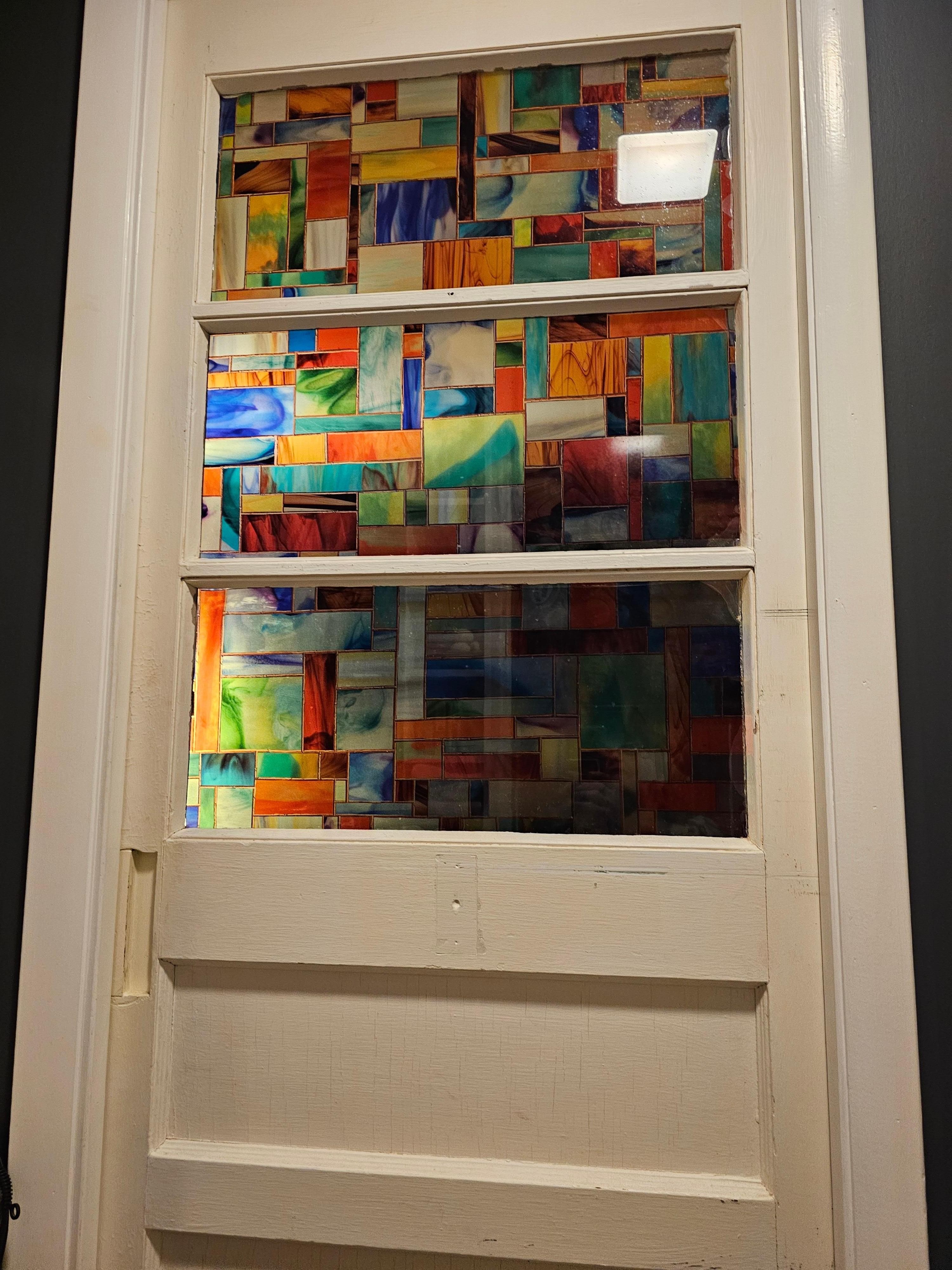 The cool pocket door on the bathroom