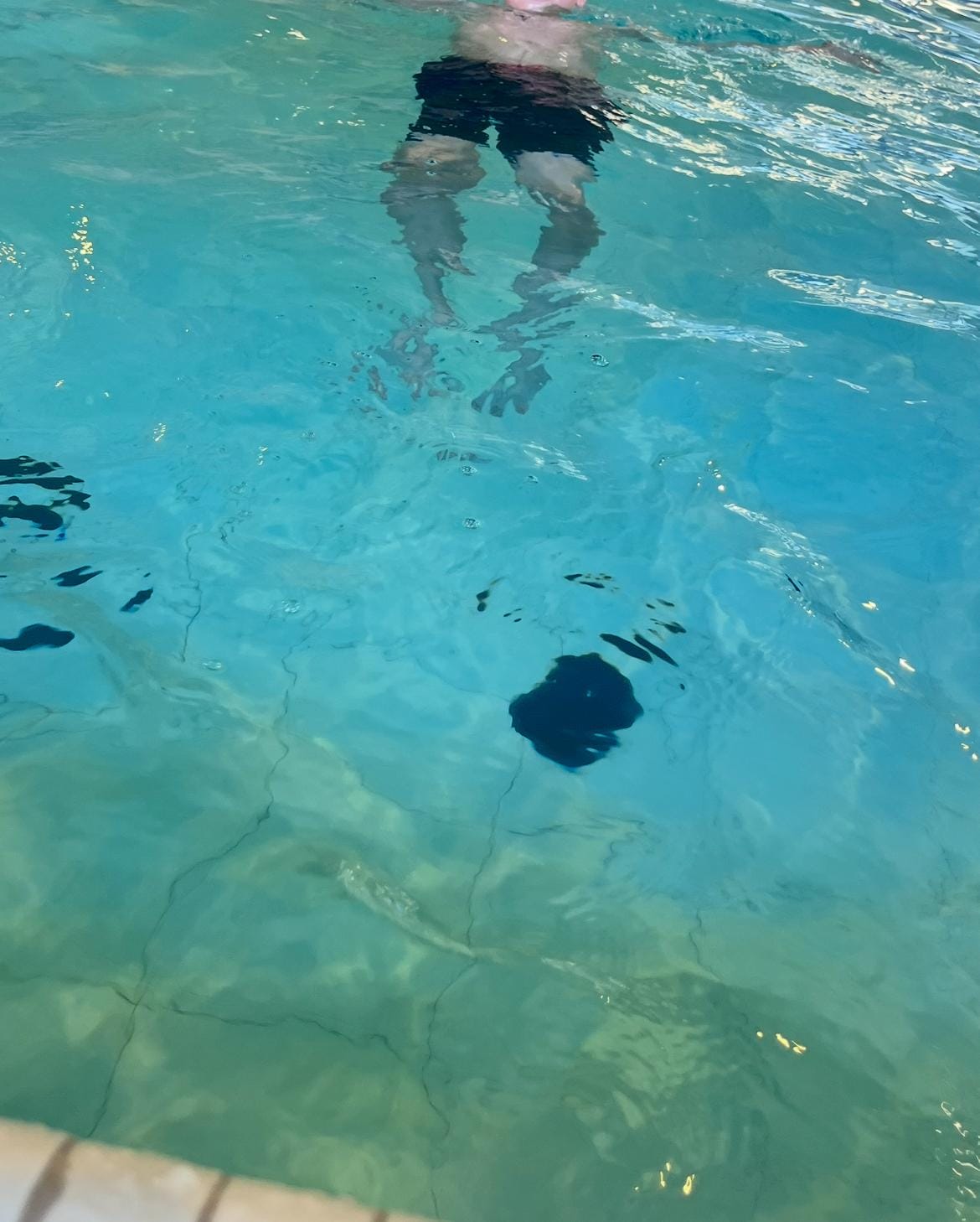 Green slippery floor at the pool