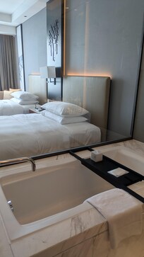 Room with 2 double beds and sofa