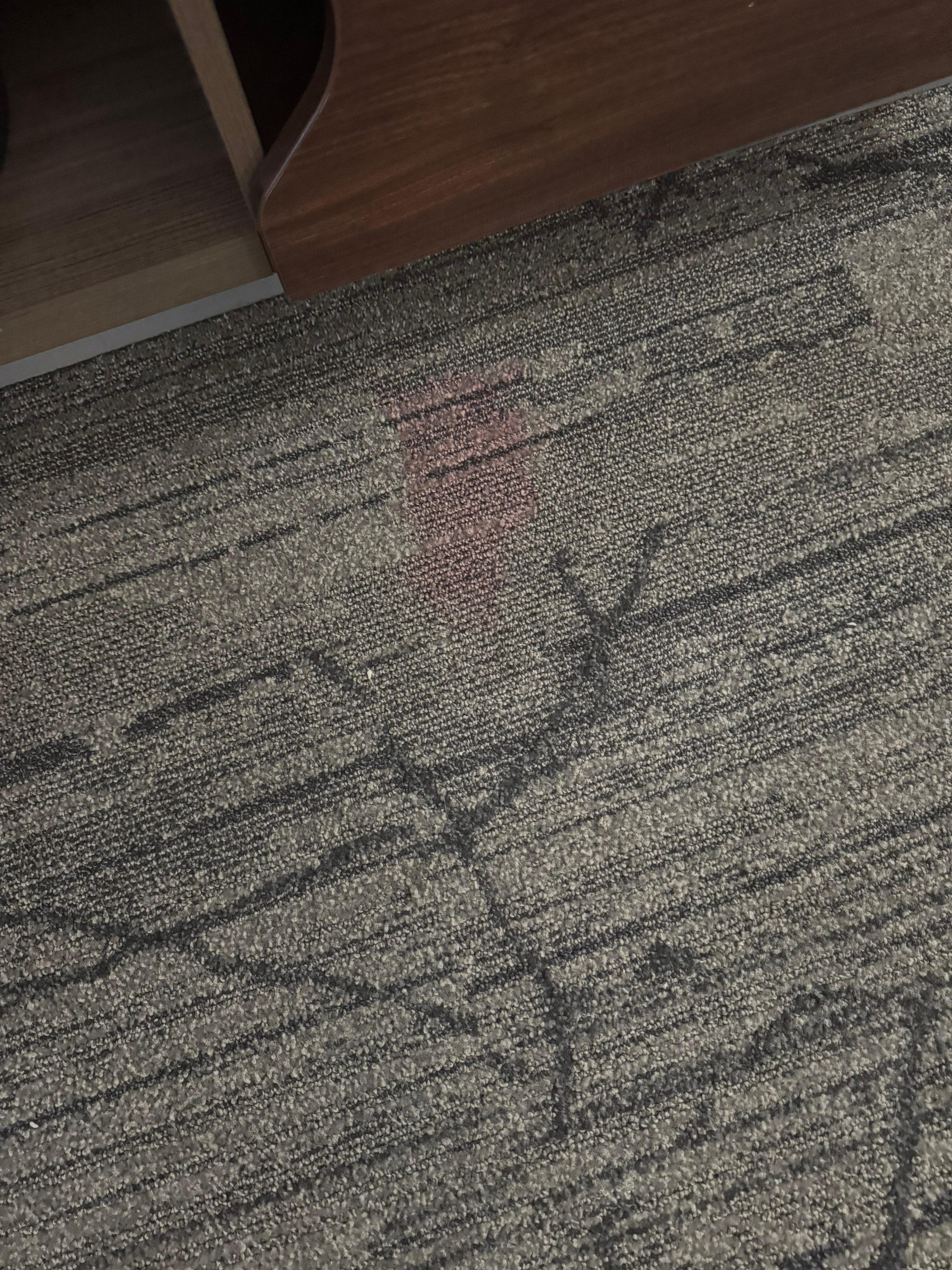 Red stains in carpet 
