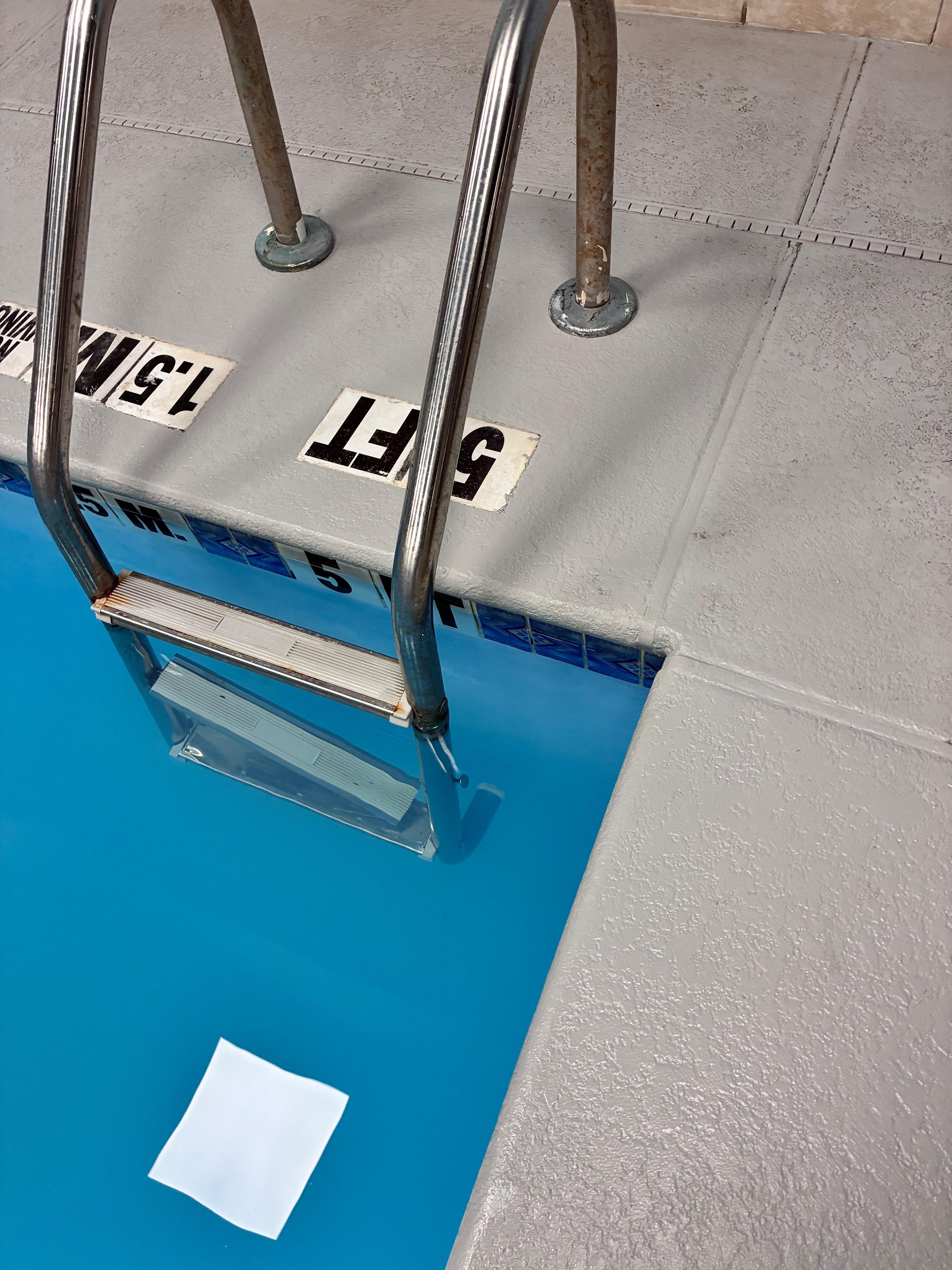 broken steps into the pool 