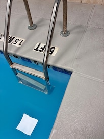 broken steps into the pool