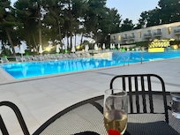 Outdoor pool. Very large. Good for actually swimming laps
