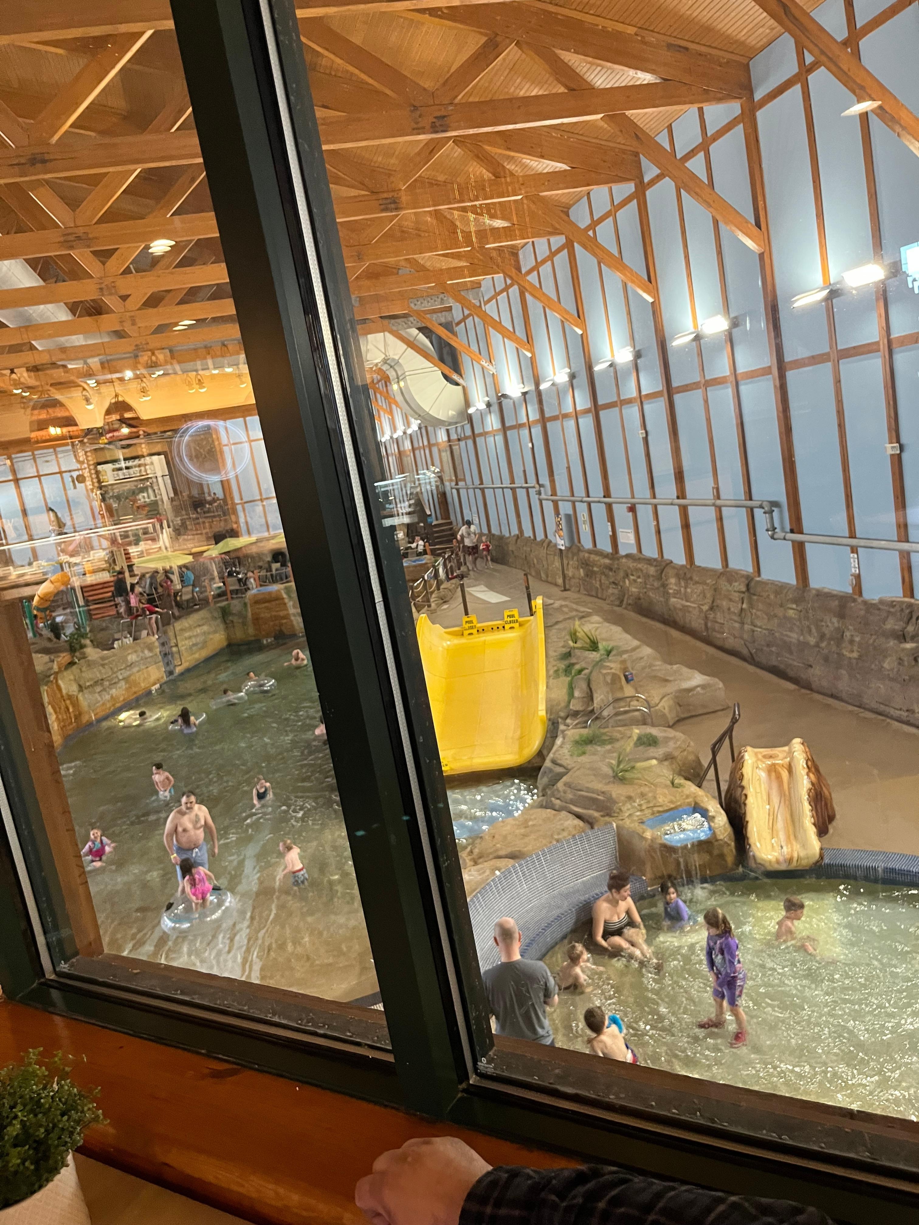 View of the water park from the resort cafe. See the closed signs for the yellow slide. The smaller children’s slides on the other section of the park were also blocked off with caution tape and signs. 