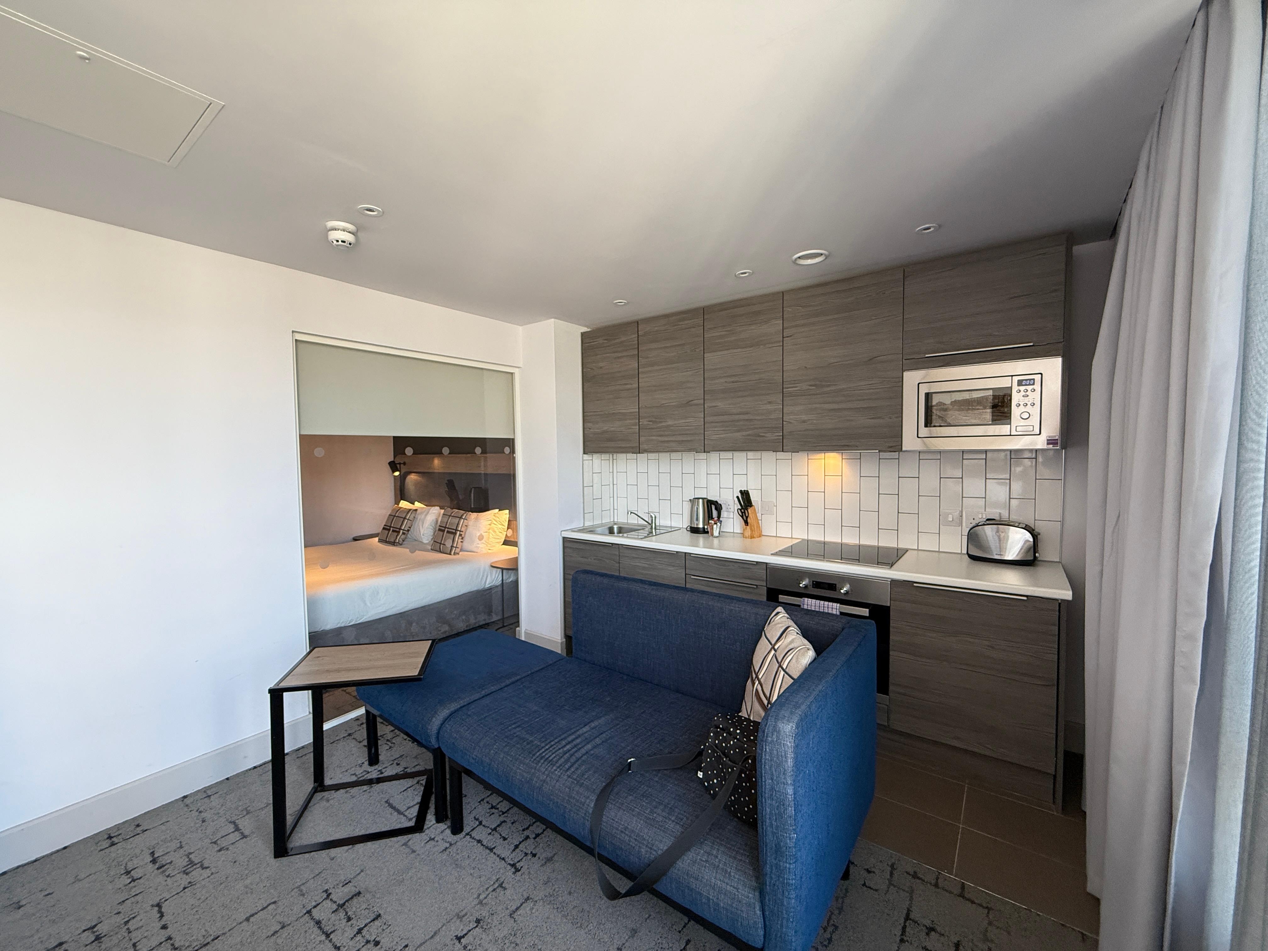 Looking across  apartment to separate bedroom
