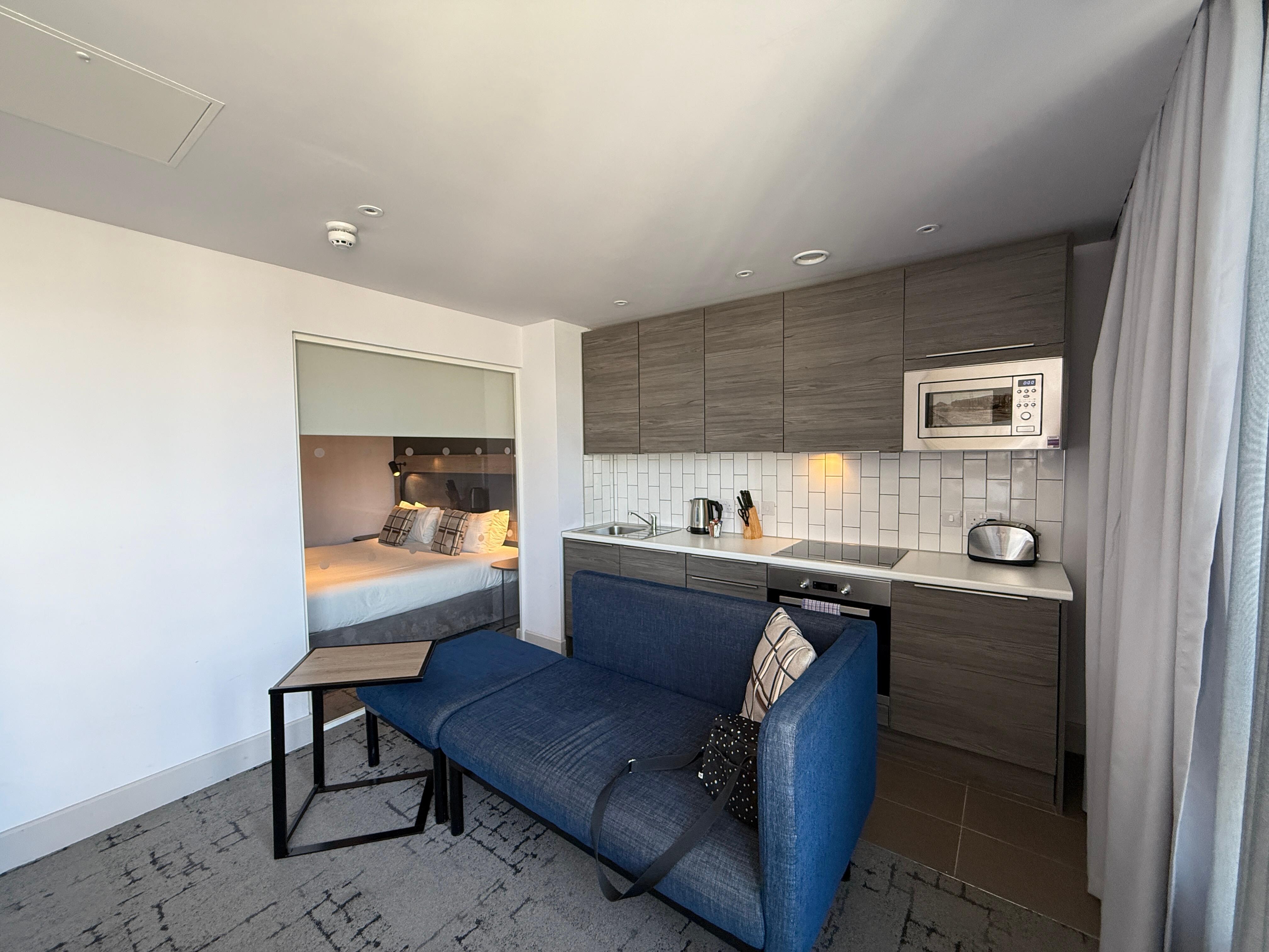 Looking across  apartment to separate bedroom