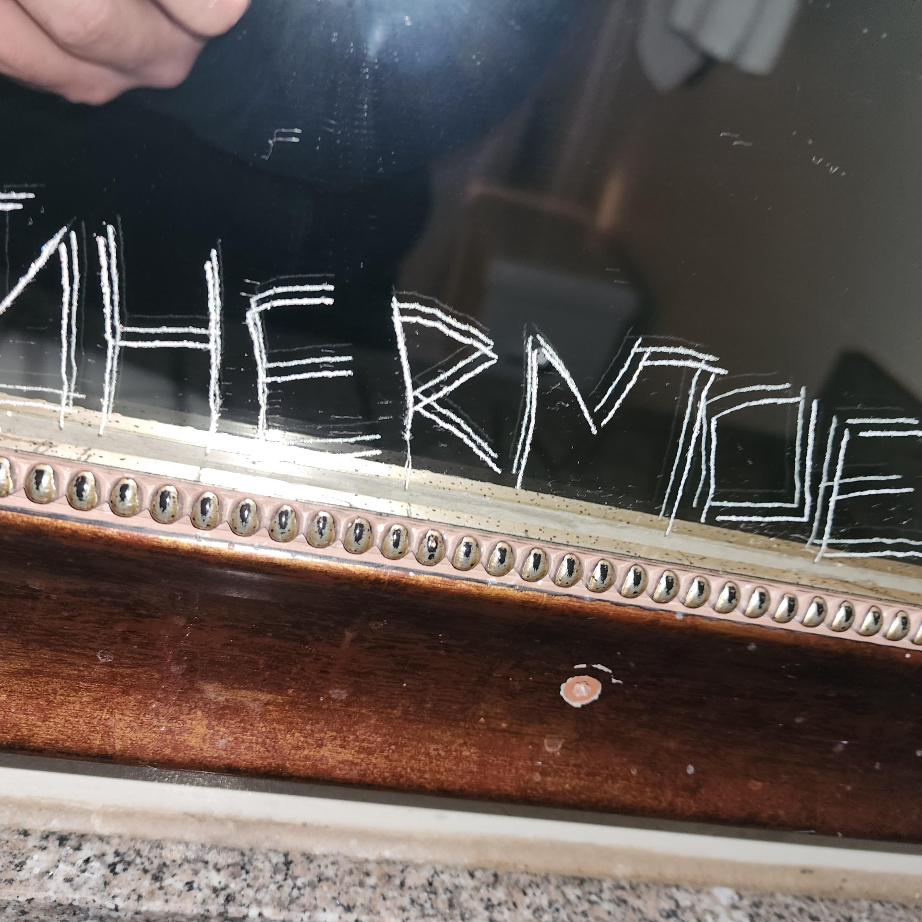 Graffiti on mirror 