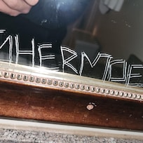 Graffiti on mirror