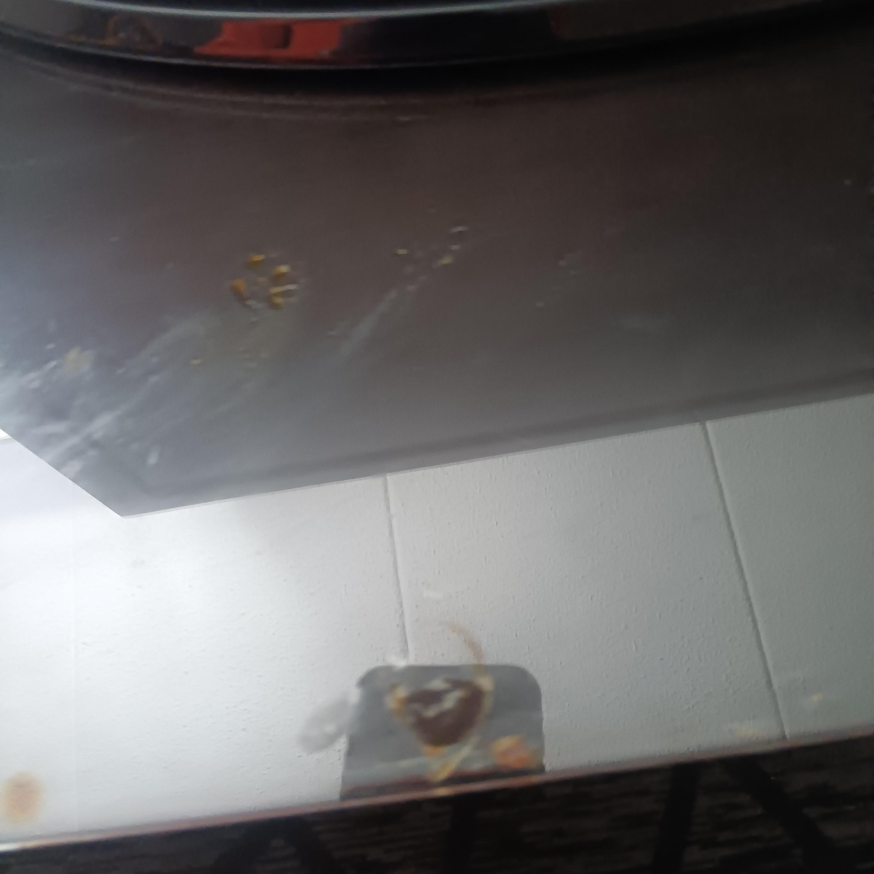 This is the dirt under the glass where the TV is