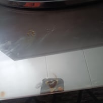 This is the dirt under the glass where the TV is