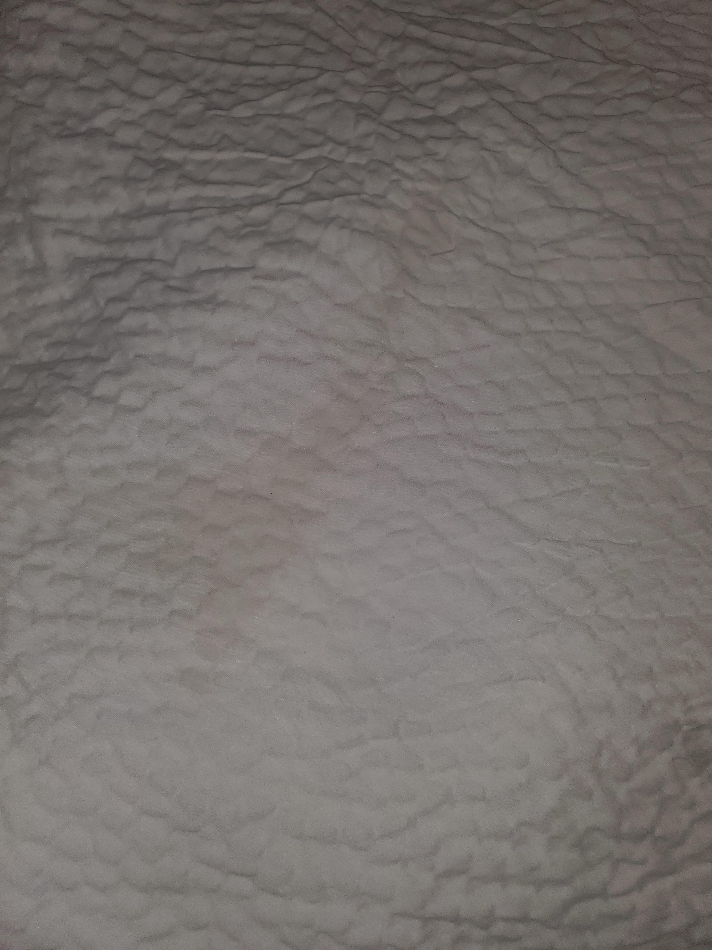 Stain on bed spread. 