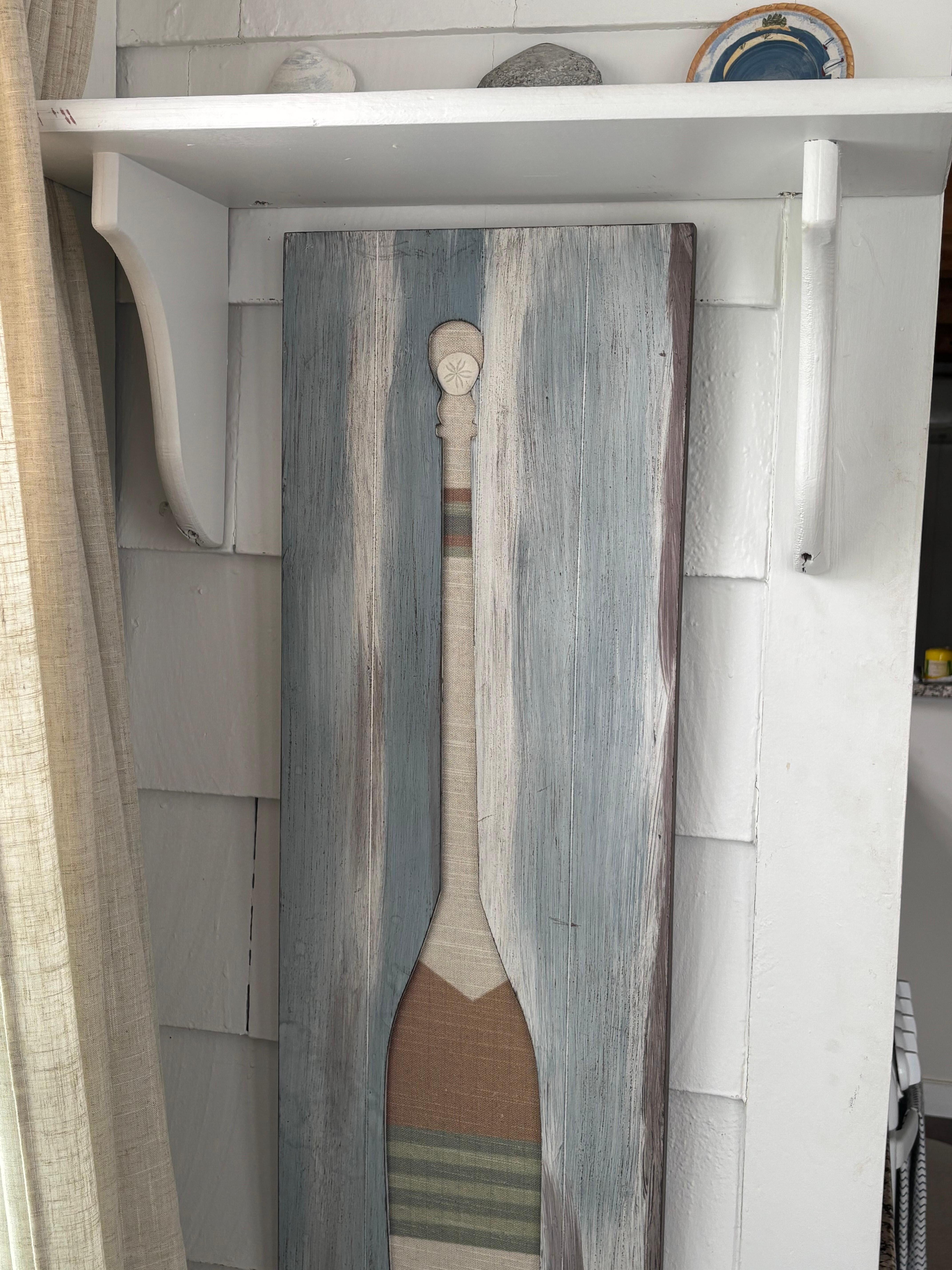 Can you see the small white sand dollar?