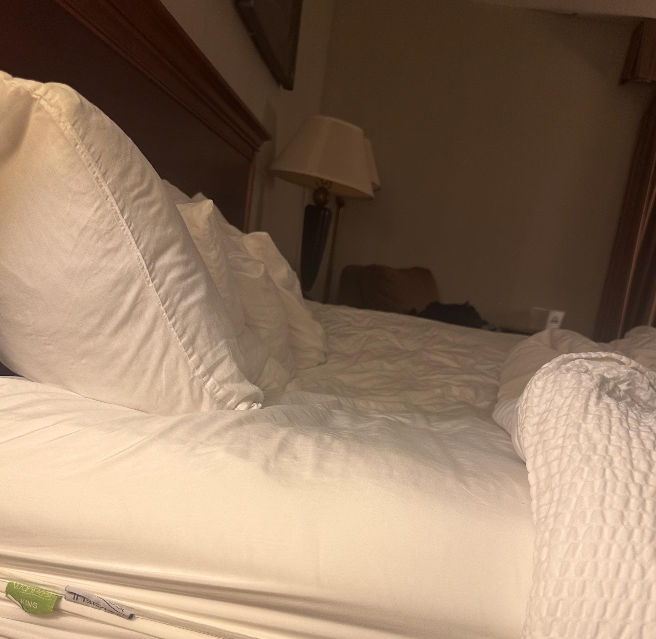 The kind bed is caving inward.