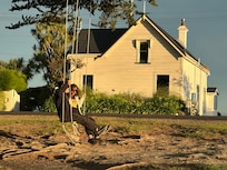 photo taken from the large grassy area in front of the home