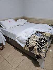 couples bed against the wall