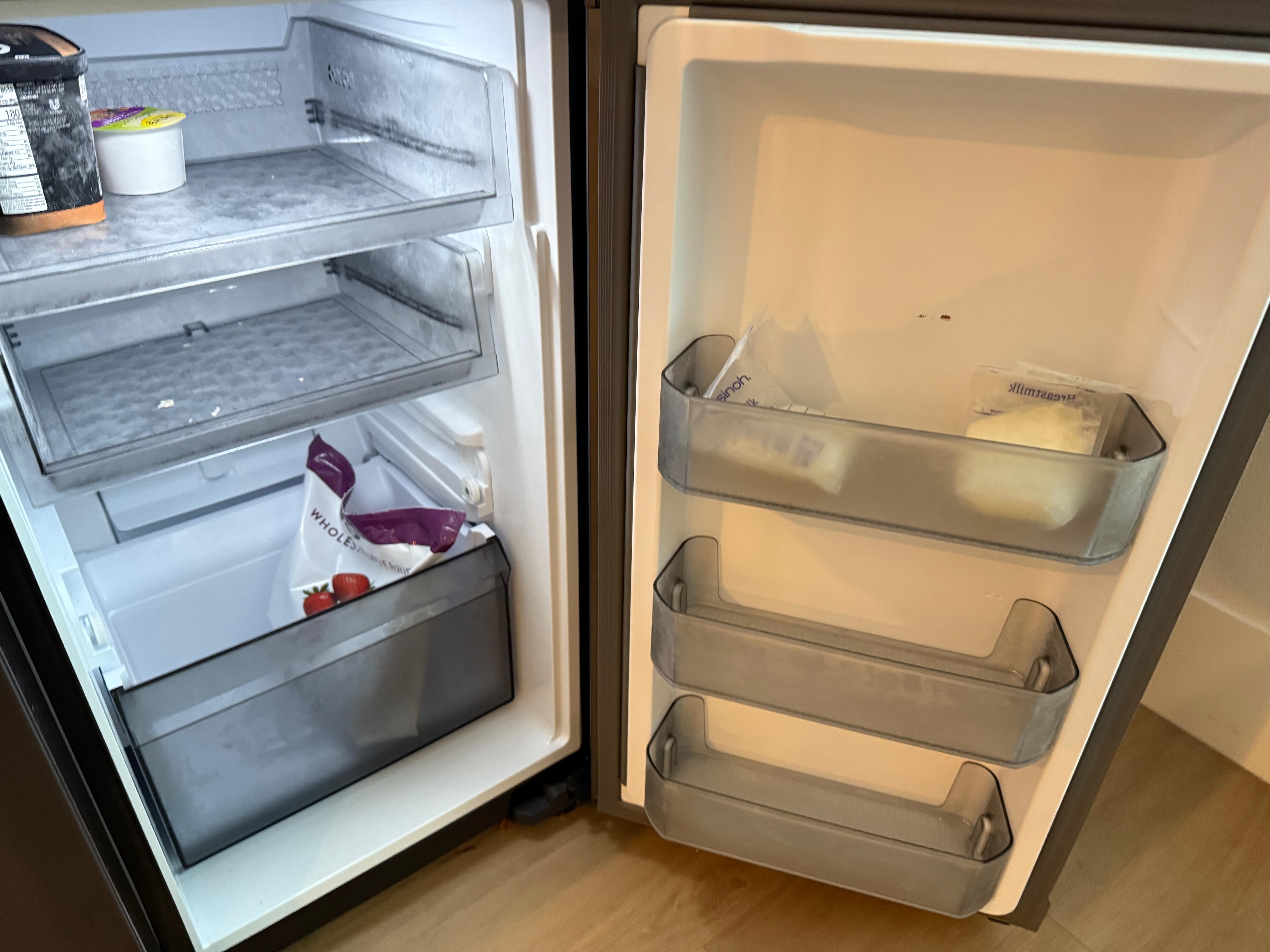Items left by previous guests in the freezer including breast milk on the right shelf. 