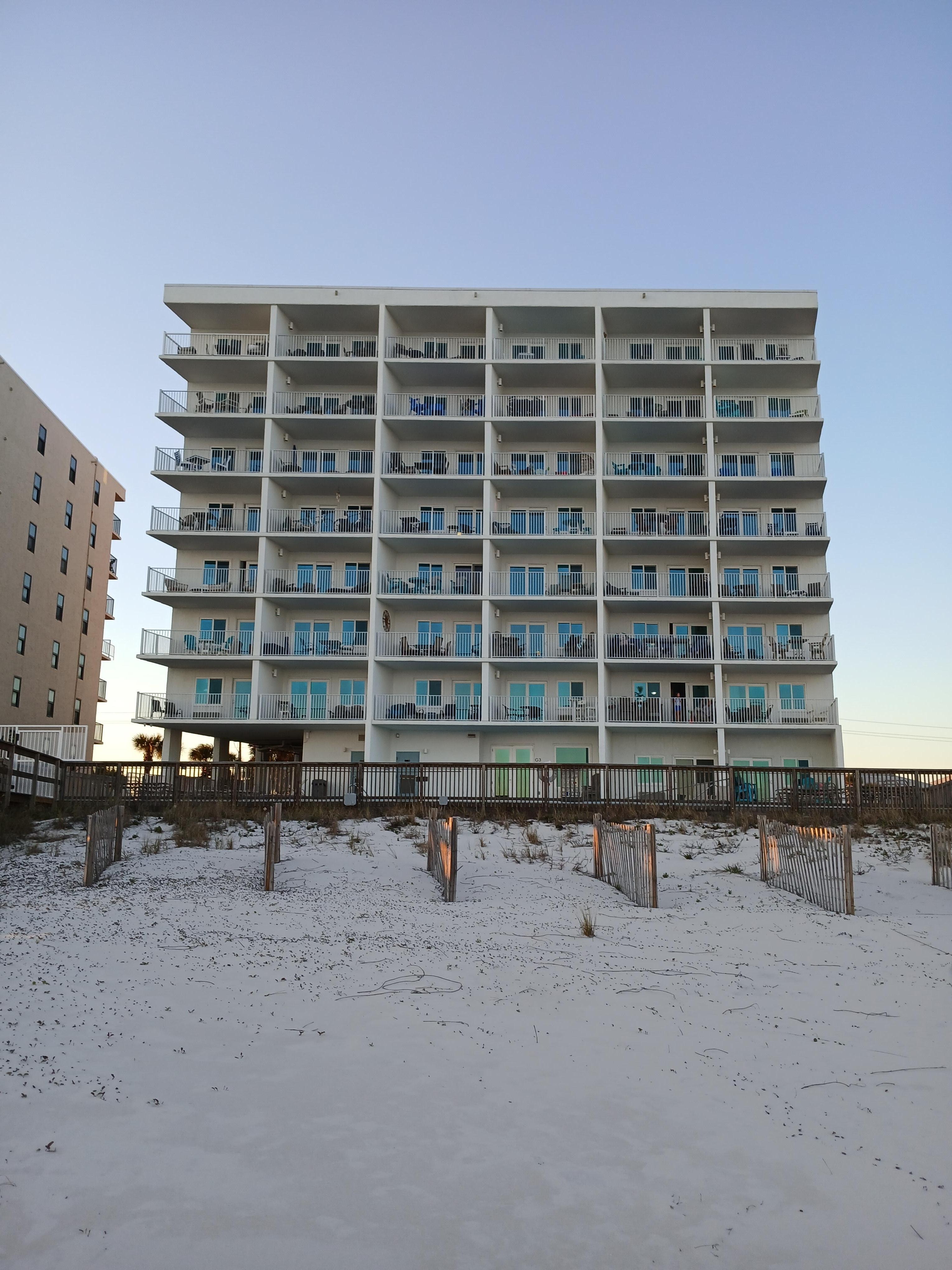 One floor from top. Great view from balcony. 