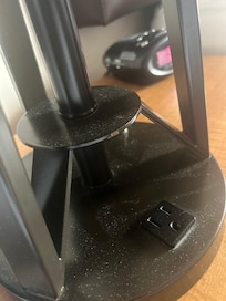 Dust on lamp next to bed