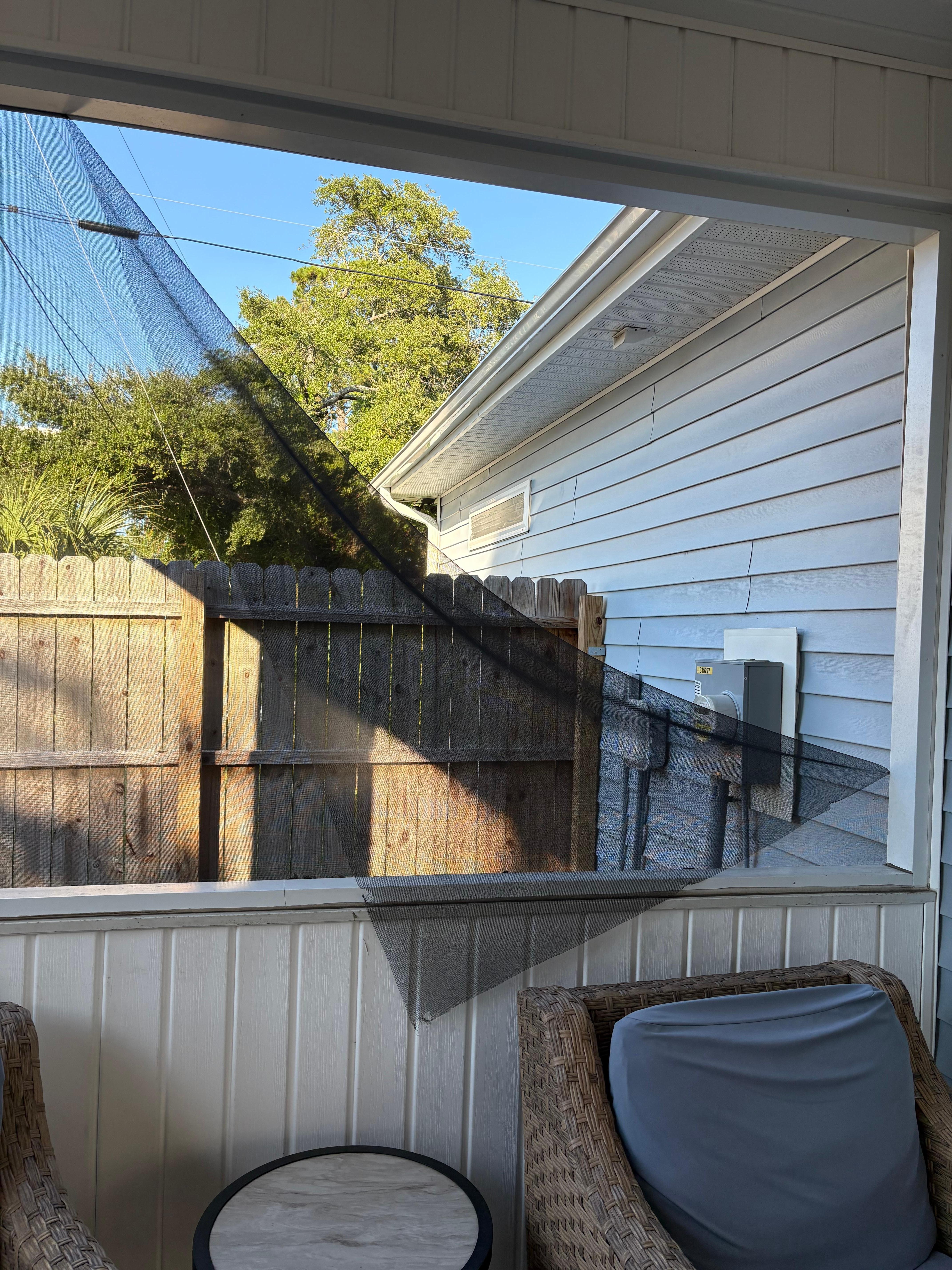 Torn screen on porch