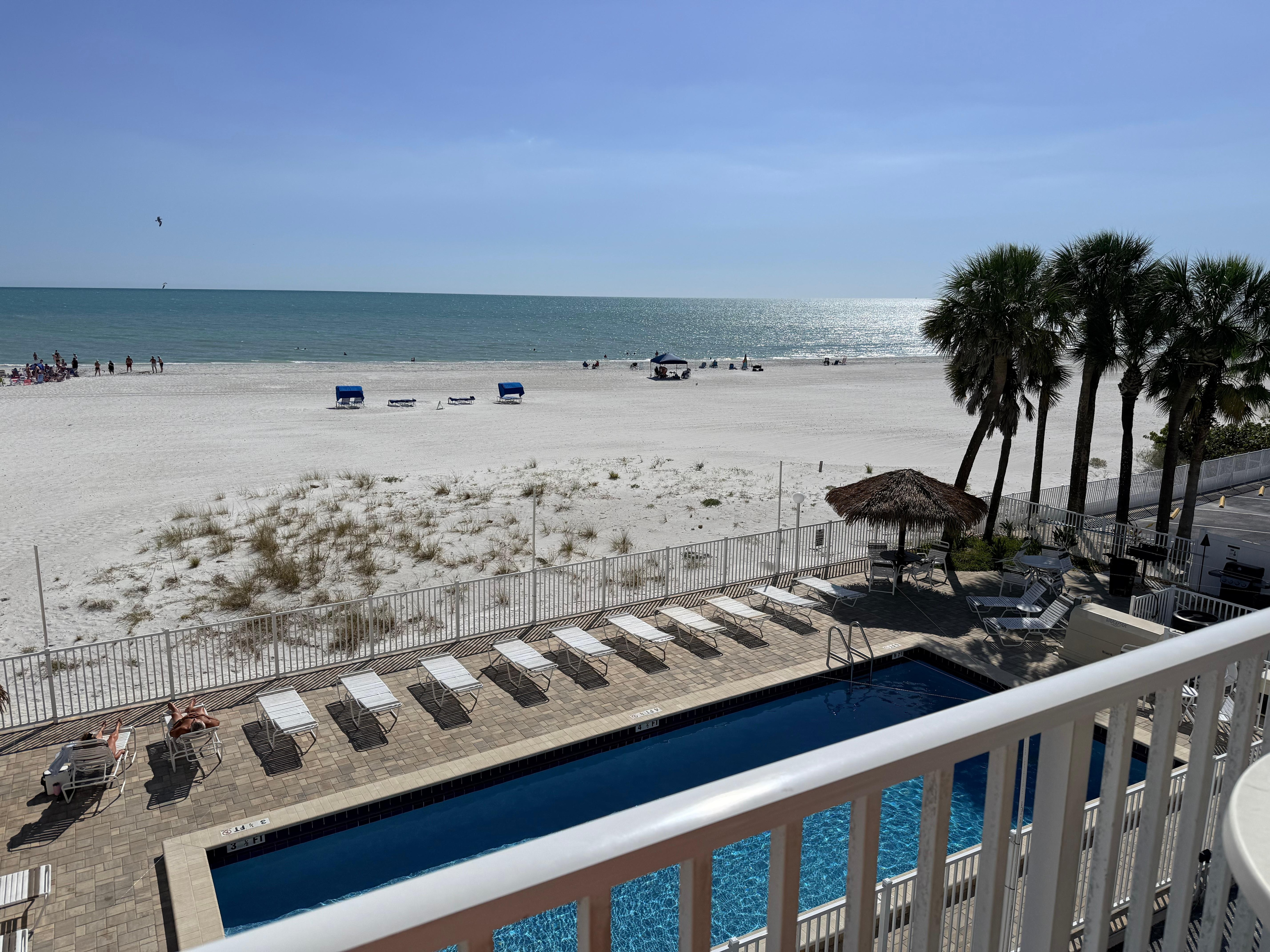 View from the balcony (community pool is right outside your window)