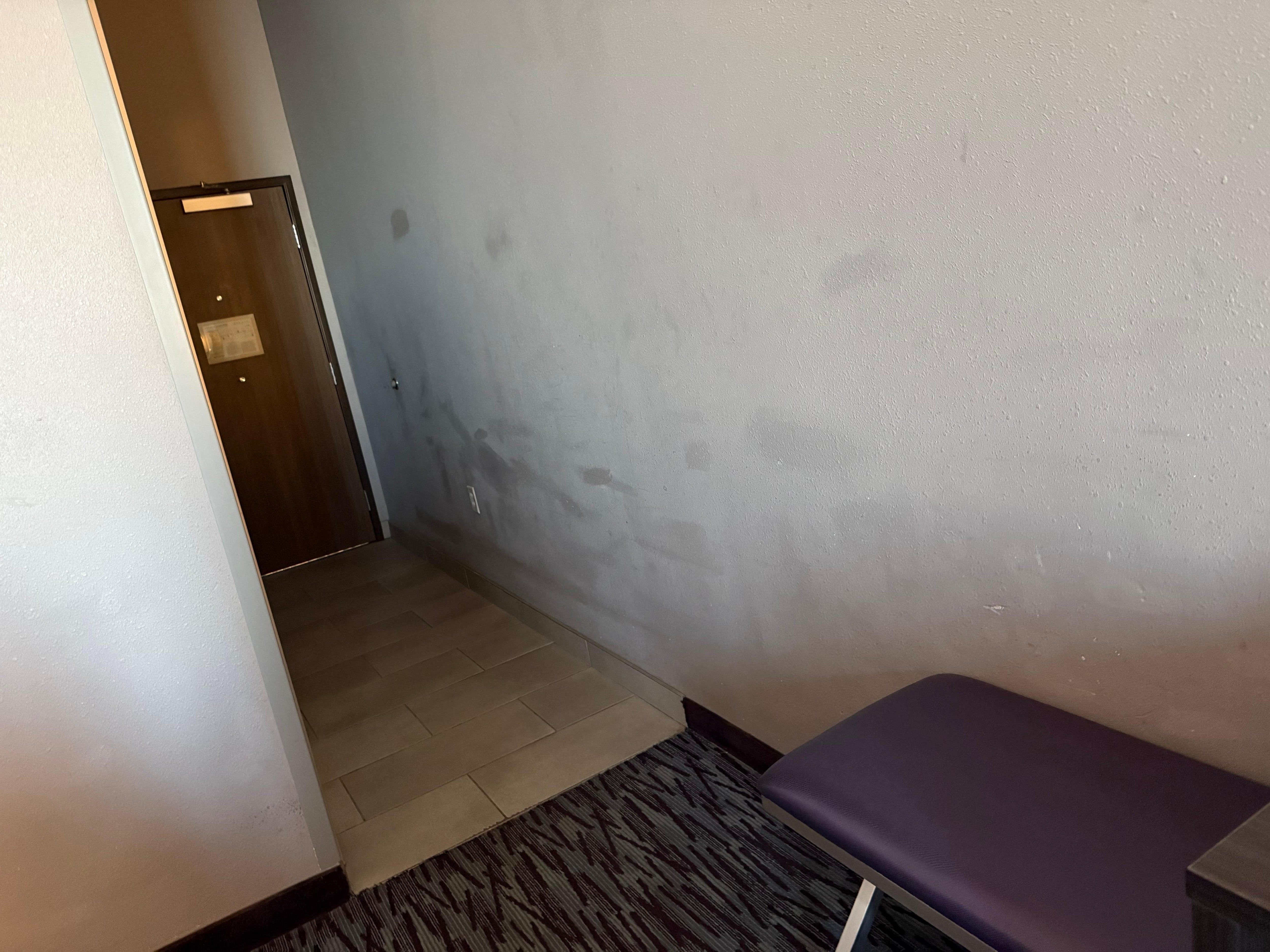 Walls paint touched up with wrong paint. Very splotchy