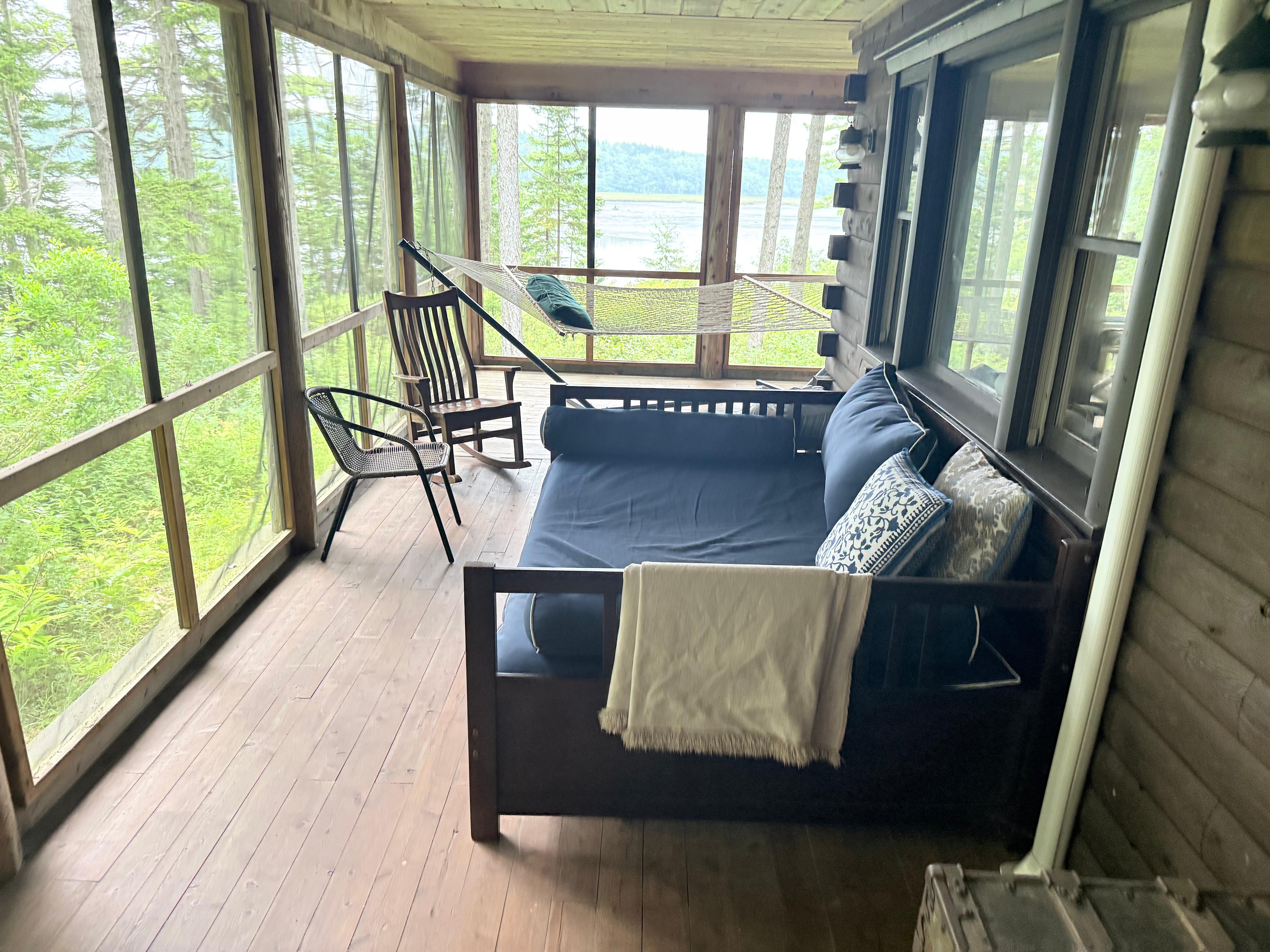 The double bed on the porch is very comfortable - lots of fresh air