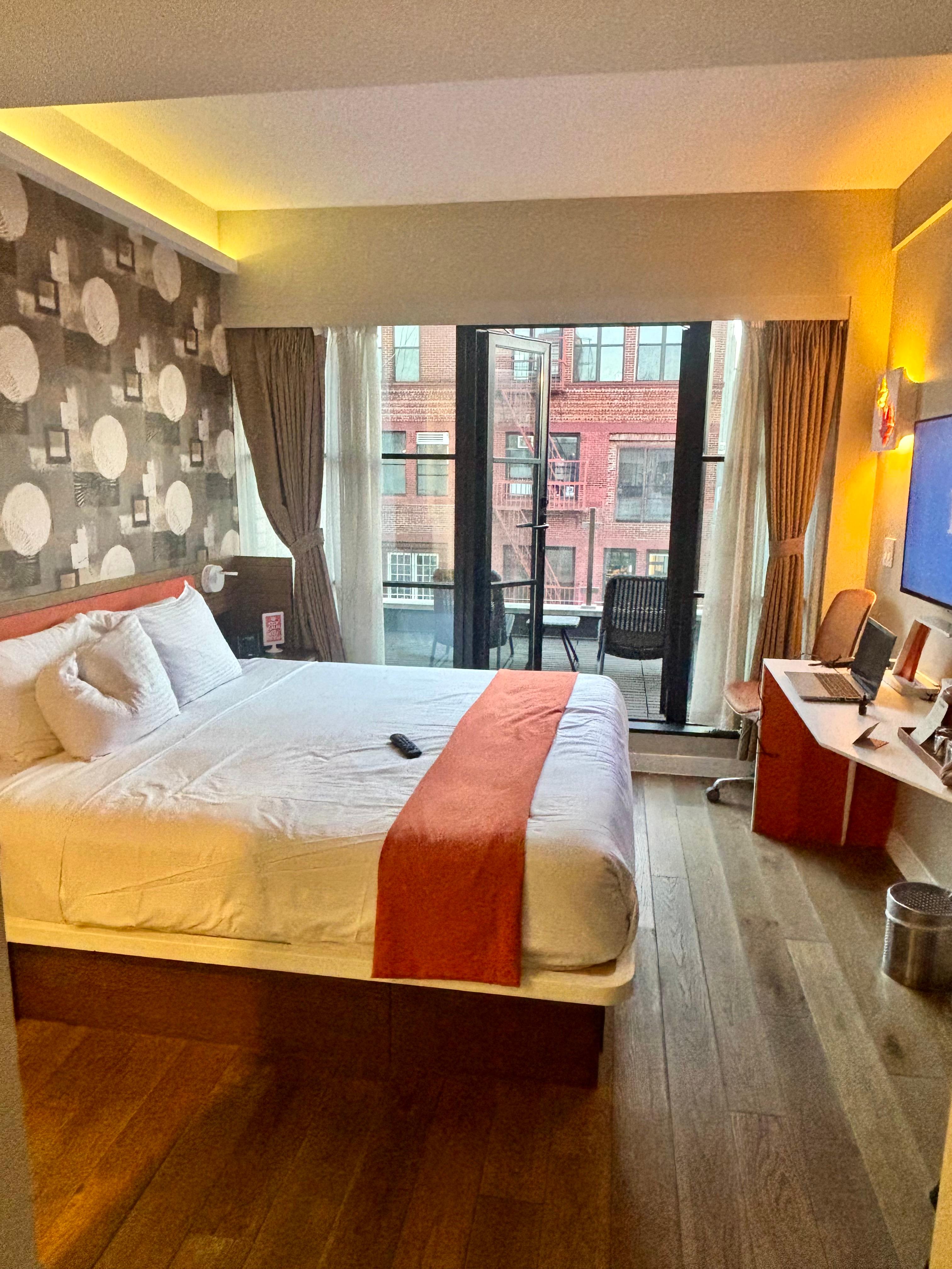 King size bed with a terrrace.
