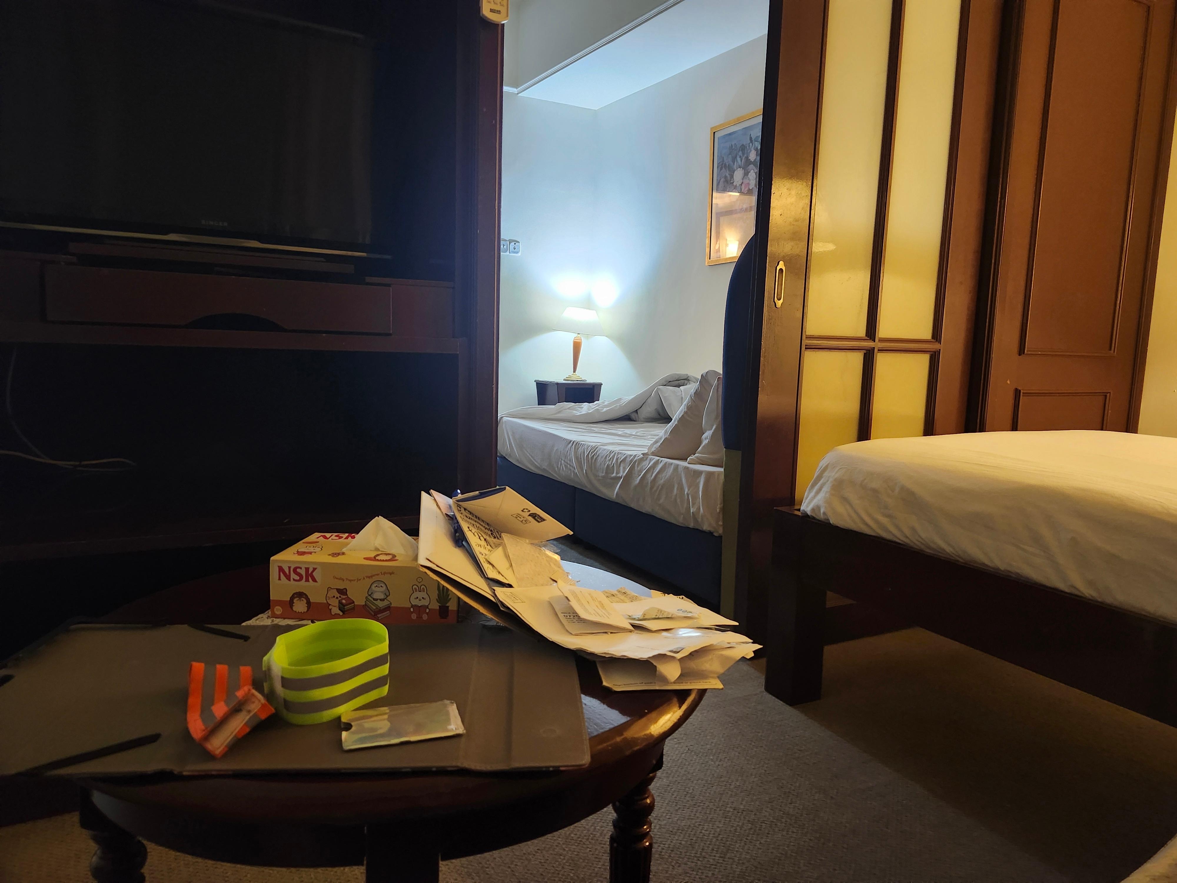 queen and king beds, tv, but the bathtub, shower and toilet are beyond