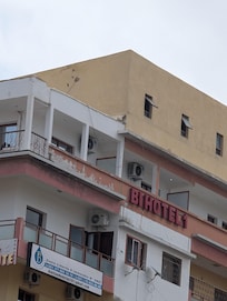 The actual hotel is only the story with the sign on it.