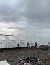 Wake created from a passing cargo ship--really cool to see from the back yard.