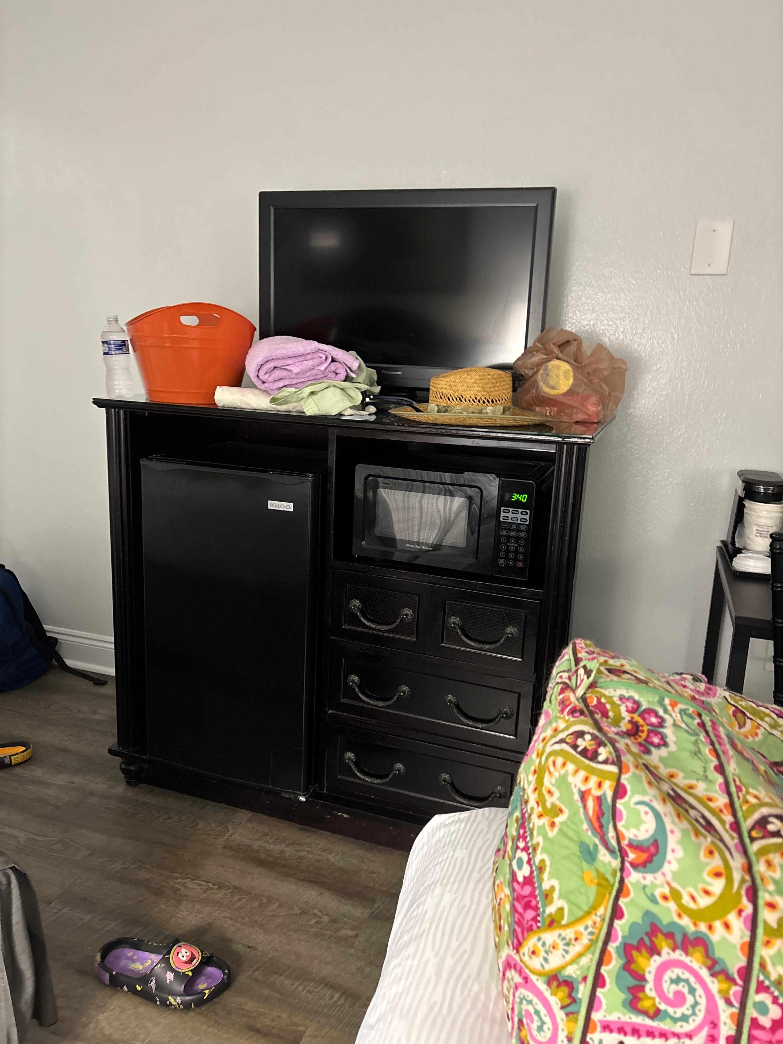 This is the small tv in the room in front of the beds. Furniture old and ugly.