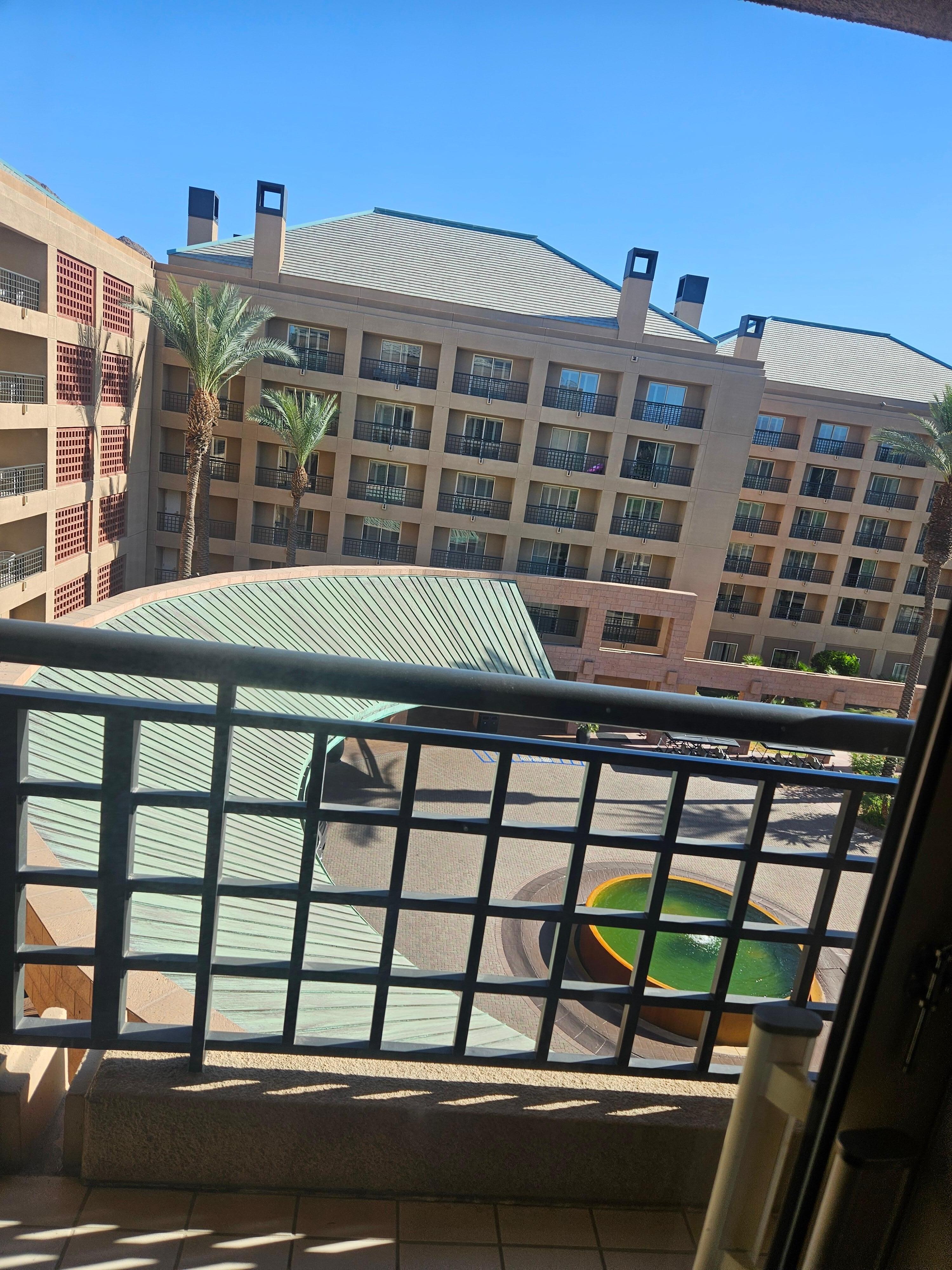 We paid for a pool view and got this from the psycho in the front desk and she threatened us and called security because we asked for a refund and to change our room. 