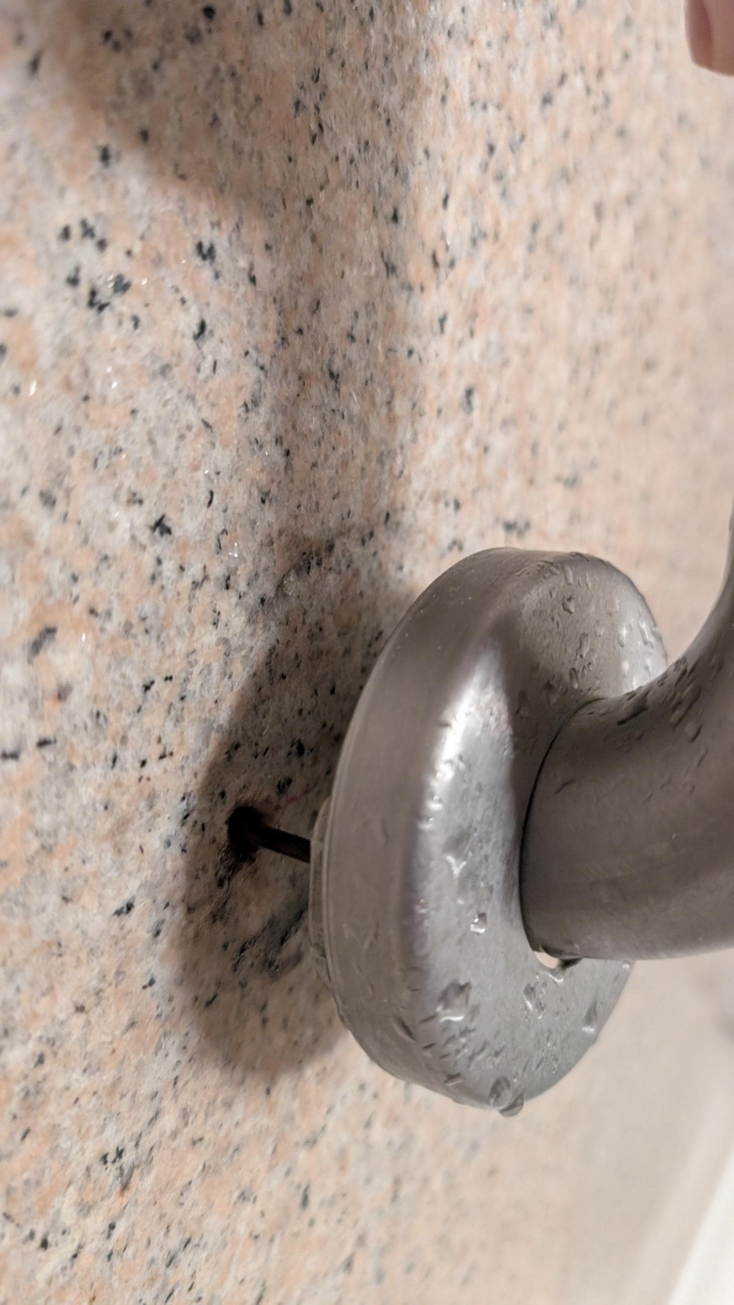 Safety shower bar pulled out from wall