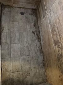 Extremely unsanitary floor, full of mold, not stained but black mold and smelly.