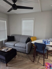 Cozy couch and dining area. Perfect for a couple.