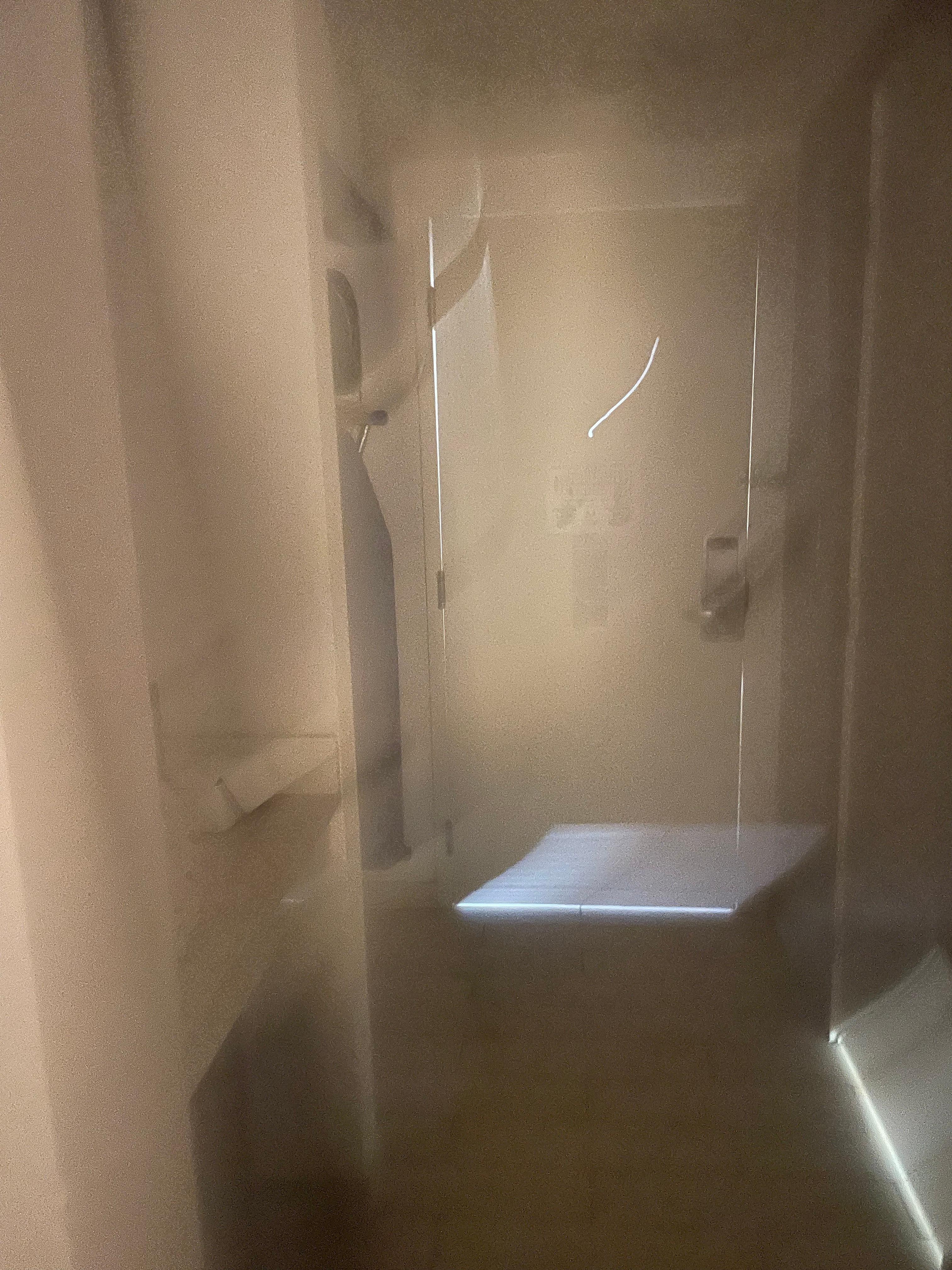 Door had several areas of light coming through 