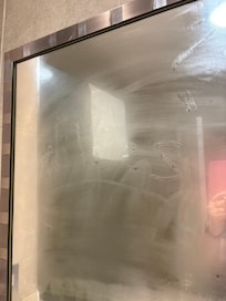 On the bathroom mirror.