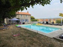 Rear view of house with pool