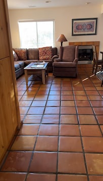 Though there was a lot of furniture in a tight space, the living room area had lots of comfy seating options.
