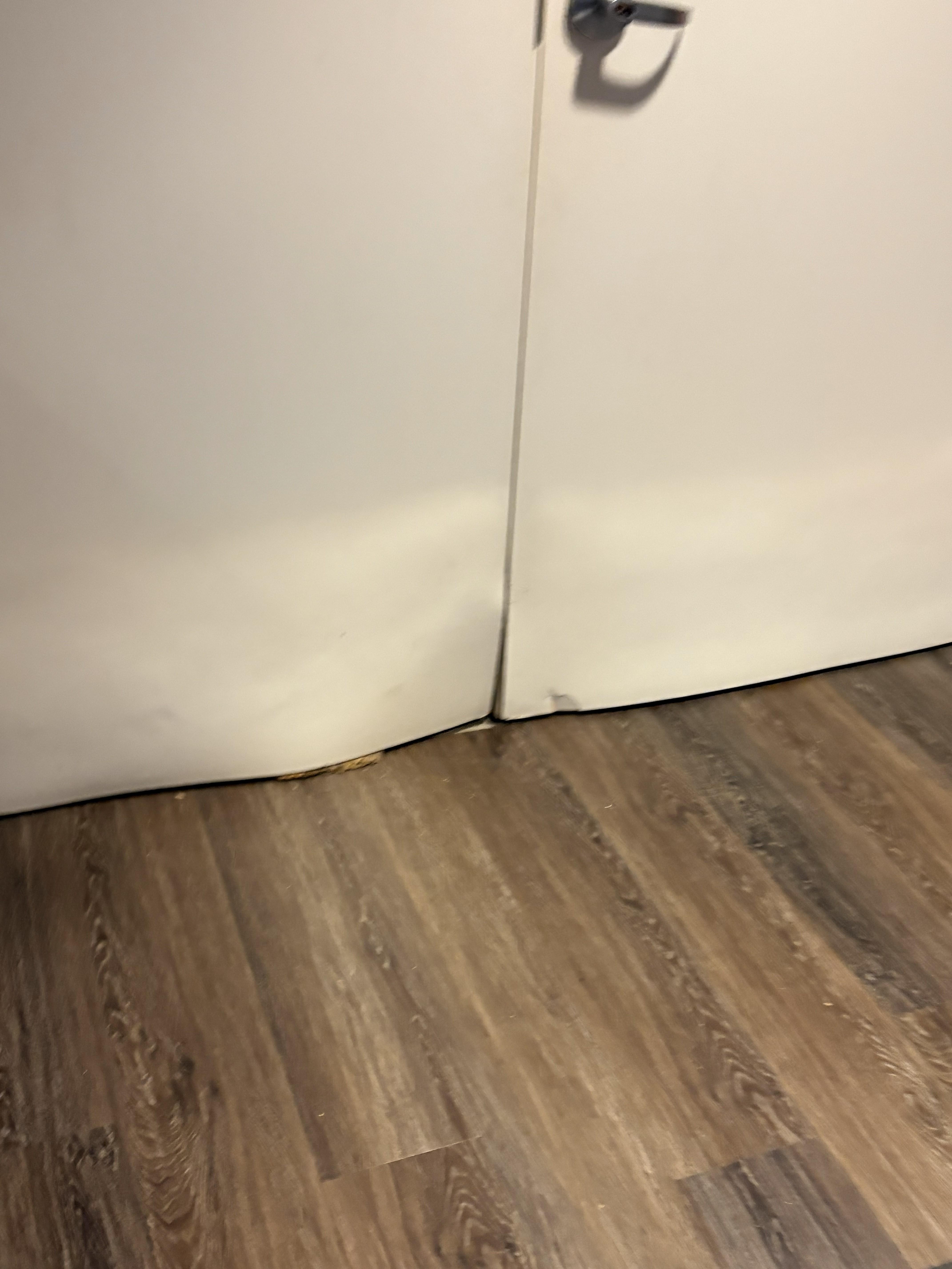 Water damage on door in fitness center.
