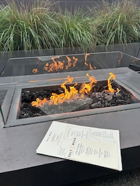 Ate outside with our furry friend and the fire pit seating was warm and comfy