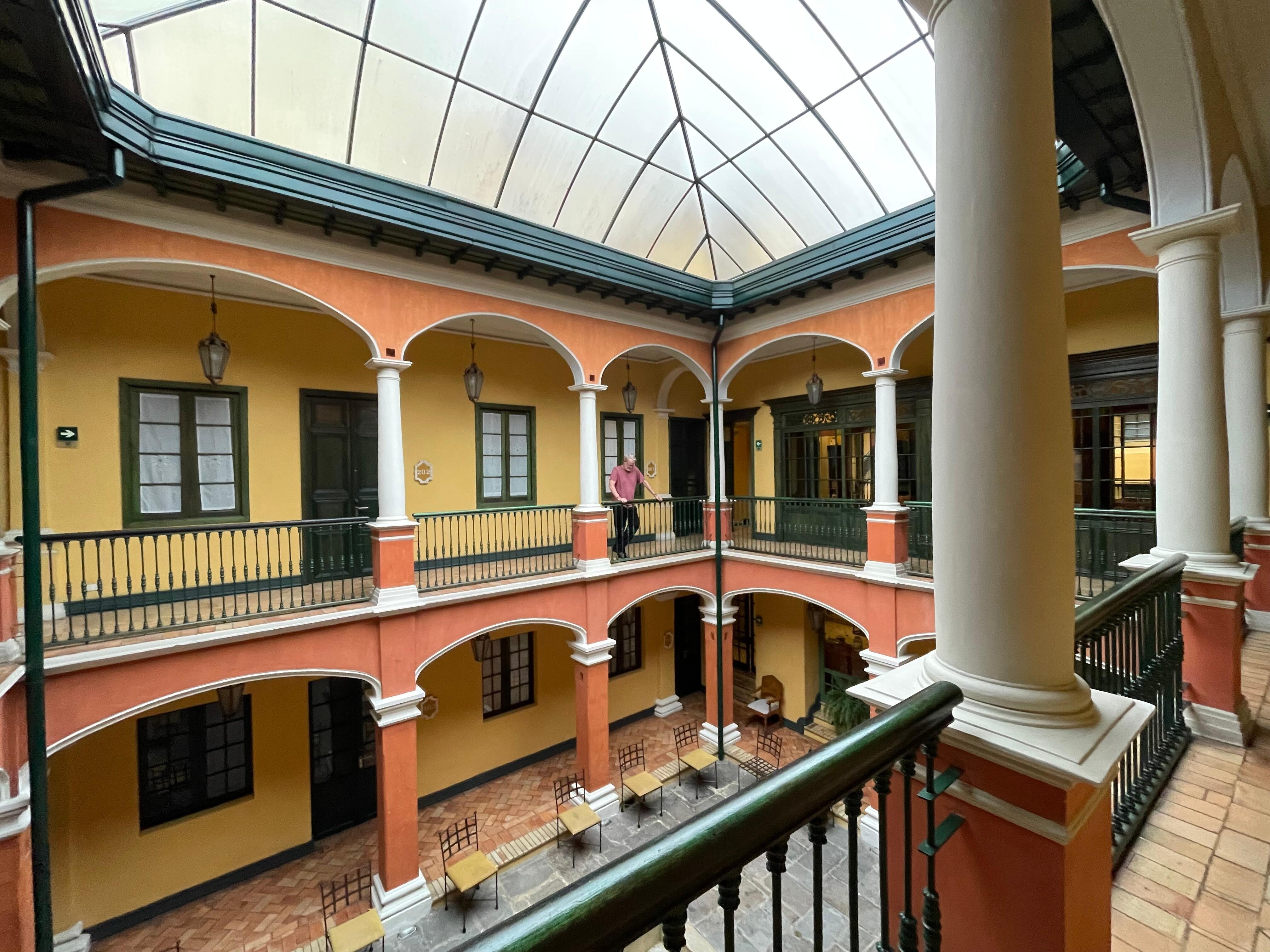 An internal atrium with doors to guest rooms
