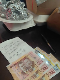 Our tip for our hotel room service.